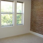 Carpet and Brick Wall